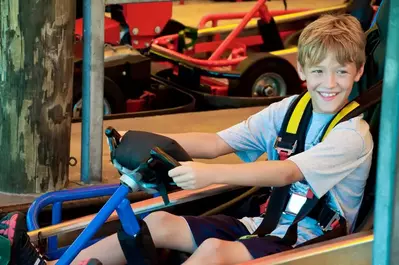 happy kid in go-kart