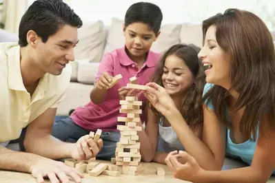 family playing jenga