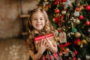 Little girl with a christmas gift