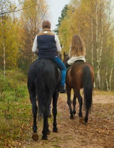 horseback riding couple